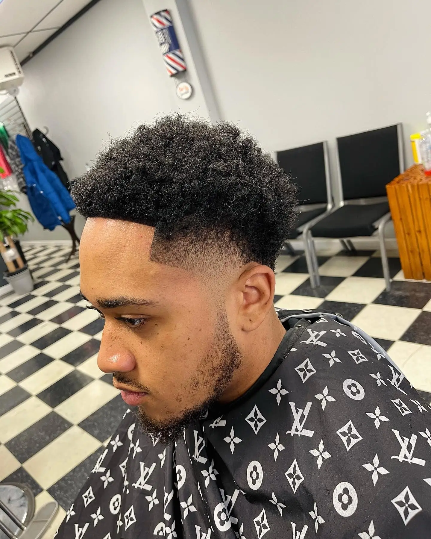 Taper with natural curls on top