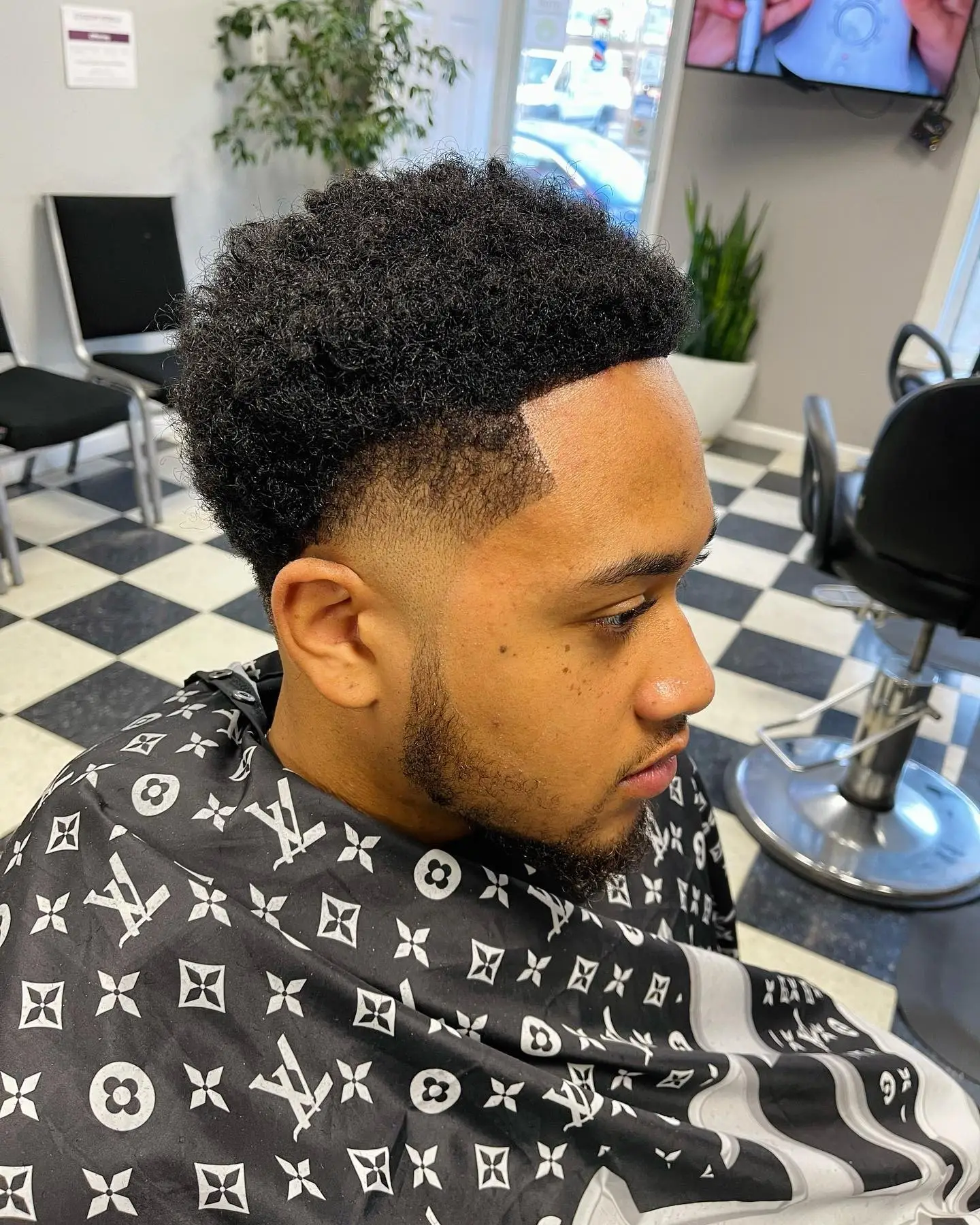 Curly top with a taper