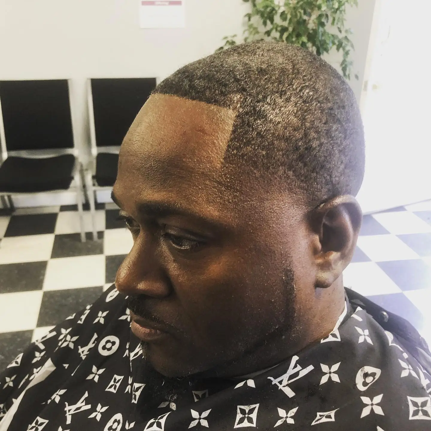 Low cut with a hard part