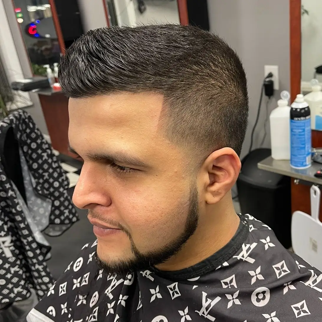 Textured top with a fade and beard